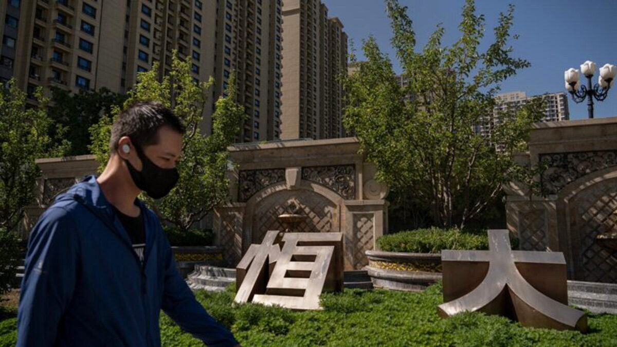 恒大项目周边居民与标识资料照;非此次股权谈判现场|来源:新唐人